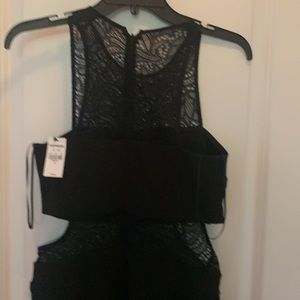 Black jumpsuit with lace cut outs